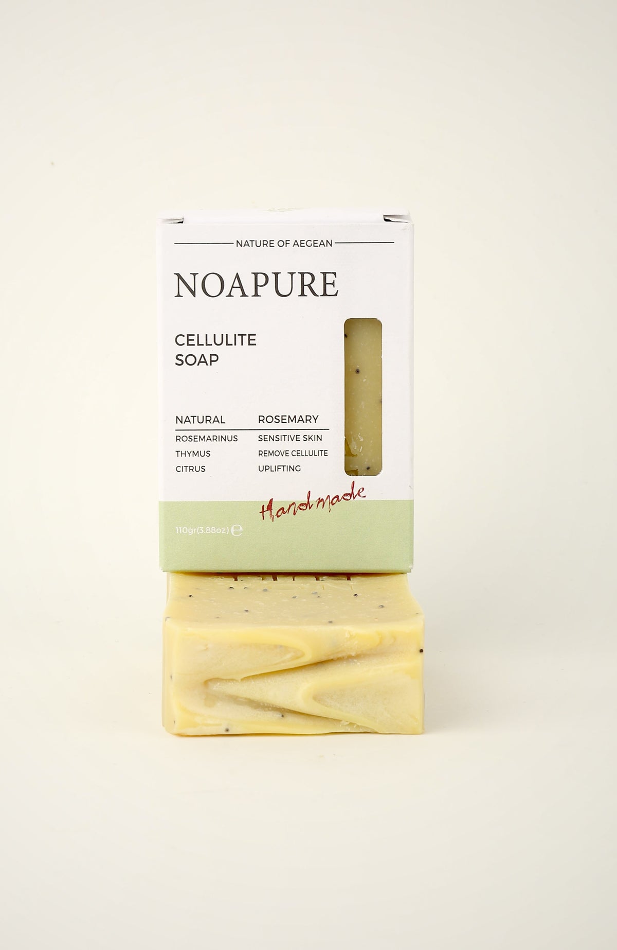 Exfoliating Body Ritual Bar with pale yellow marbled botanical soap and NoaPure packaging on a white background