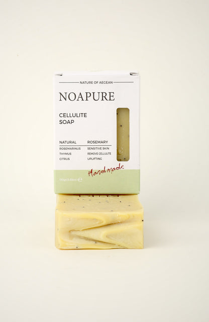 Exfoliating Body Ritual Bar with pale yellow marbled botanical soap and NoaPure packaging on a white background